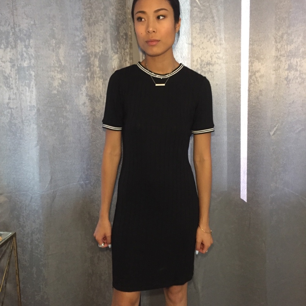 Tight black dress with striped collars